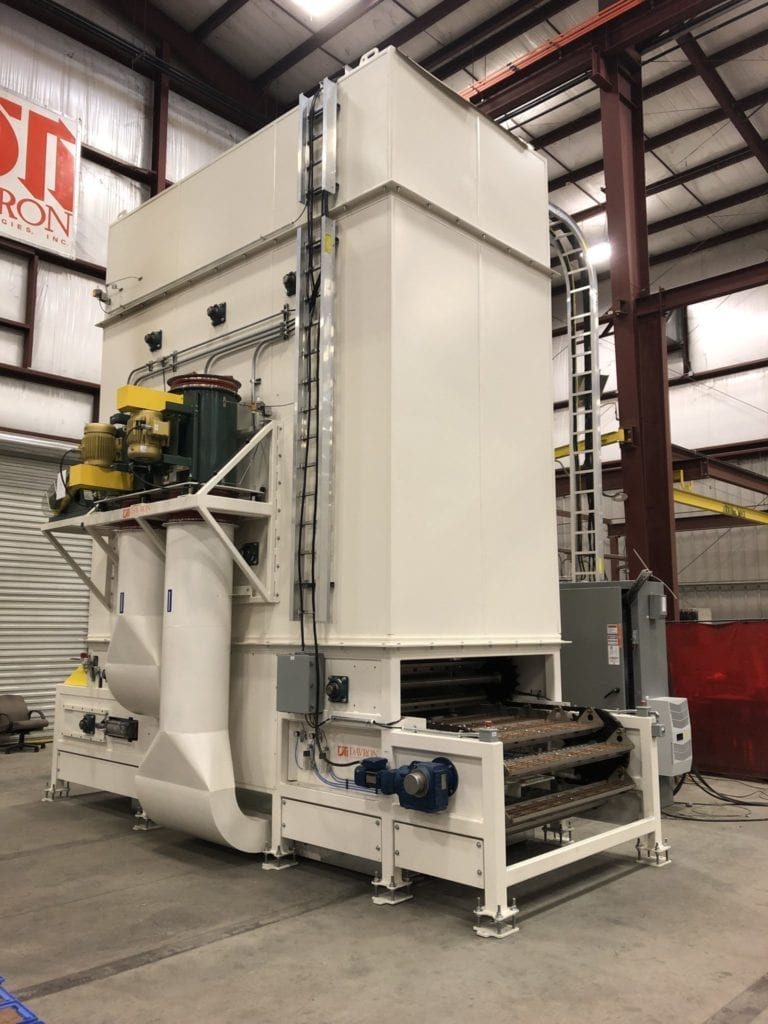Tall vertical oven in Davron manufacturing facility.